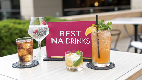a pink sign reading 'best N/A drinks' next to a variety of cocktails
