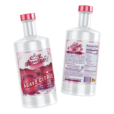 Two bottles of 'Day Dreamer' agave citrus with red caps on a white background.