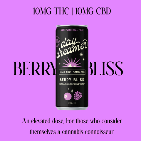 Cannabis sparkling water can labeled 'Day Dreamer Berry Bliss' on a pink background