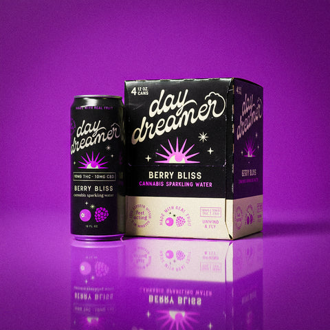 Day Dreamer Berry Bliss cannabis sparkling water can and box on a purple background
