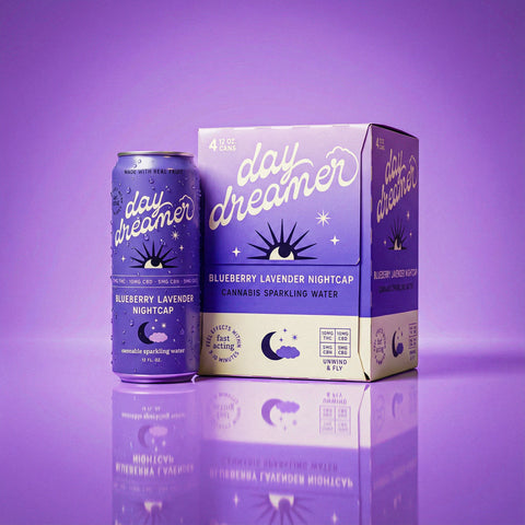 Day Dreamer Blueberry Lavender Nightcap cannabis sparkling water can and box on a purple background