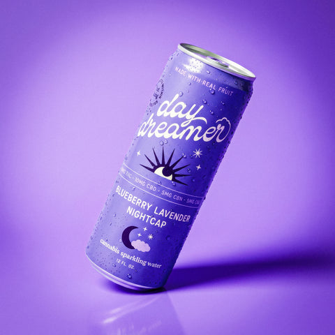 Can of 'day dreamer' Blueberry Lavender Nightcap on a purple background