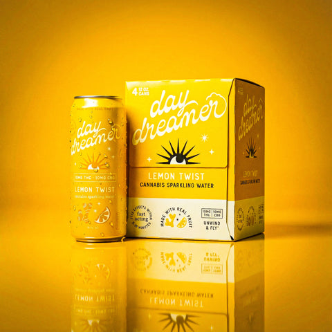 Day Dreamer Lemon Twist cannabis sparkling water can and box on a yellow background
